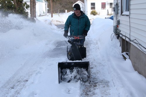Clearing snow.