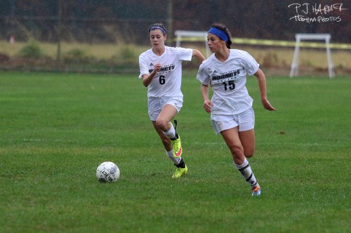 Chasing down the ball.