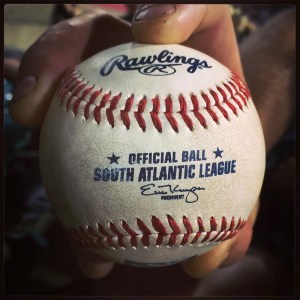 Walking away with a ball.